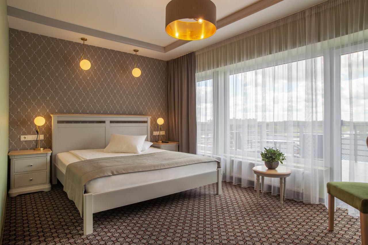 Hotel Sinchronas Telsiai Bagian luar foto